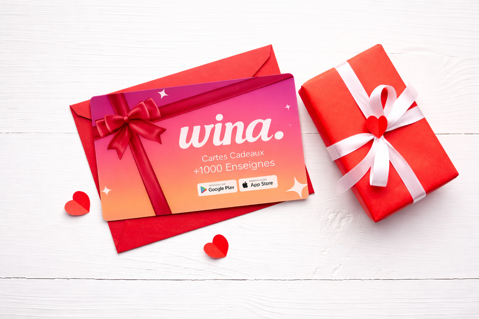 Carte cadeau WINA posée sur une enveloppe rouge avec un cadeau emballé.